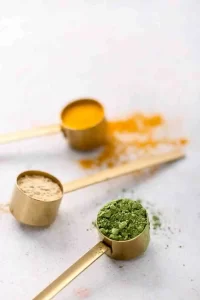 Homemade green tea, turmeric, and gram flour face mask for natural skin brightening and radiance.