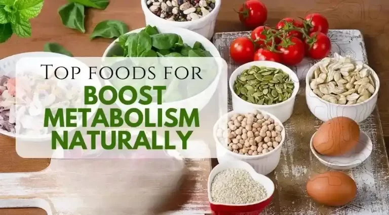 A variety of natural metabolism-boosting foods including green tea, chili peppers, lemon water, and fresh herbs, on a wooden table.