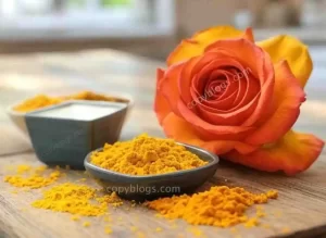 Rose and turmeric face mask in bowl with petals and turmeric powder. Source: copyblogs.com