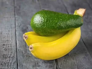 Freshly mashed avocado and banana blended in a bowl ready to be spread for soft, nourished skin.