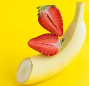 Nourishing DIY strawberry face mask with banana and olive oil.