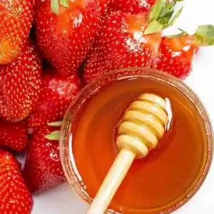 DIY strawberry face mask with honey for acne-prone skin.