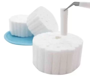 Clean gauze pad pressed on bleeding gum area