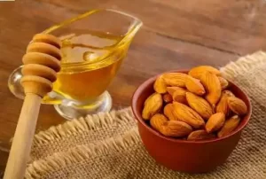 Almond oil and honey mask to lighten dark lips.