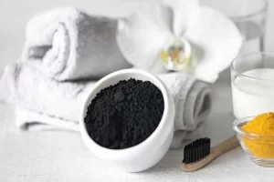 Turmeric, milk, and charcoal paste reduces spots and redness.