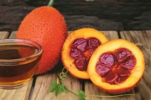 Gac fruit oil for softening and brightening lips.