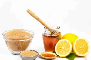Lemon, honey, and sugar mix for dark lip lightening.