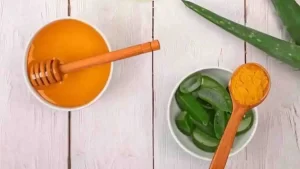 DIY turmeric paste with honey and aloe vera for wound healing.