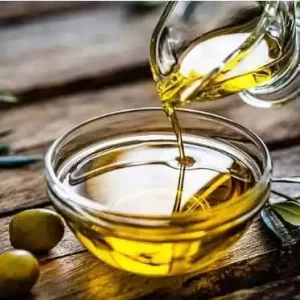 Saw palmetto berries in a wooden bowl.