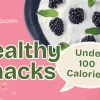 Healthy snacks under 100 calories with yogurt and blackberries in a warm pink background.